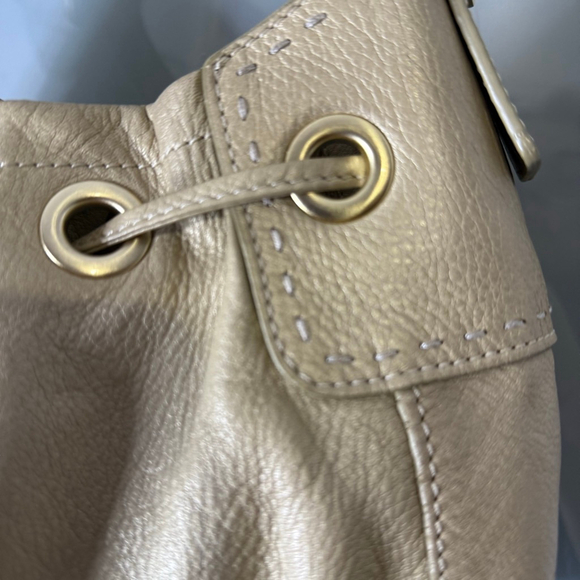 Cole Haan Metallic Beige Leather Drawstring Shoulder Bag - Picture 3 of 14